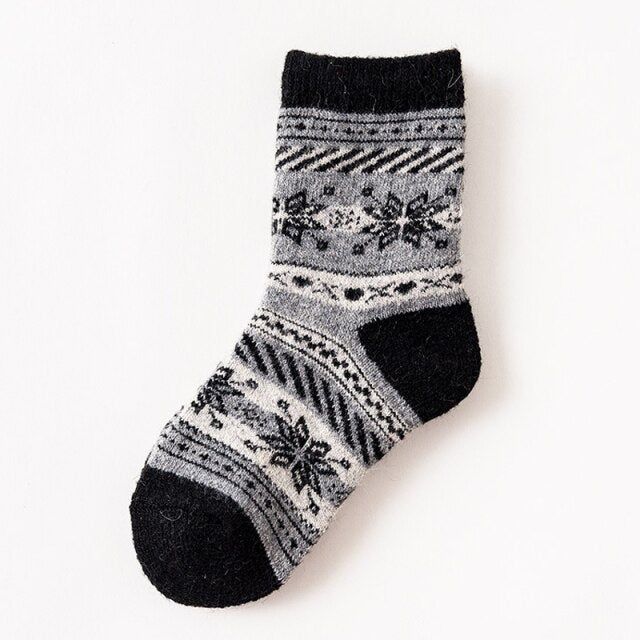 Teplé ponožky se zimními motivy