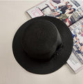 Pletený klobouček s černou stuhou