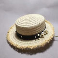 Dámský slaměný klobouk s ozdobou
