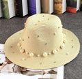 Slaměný klobouk s perlama