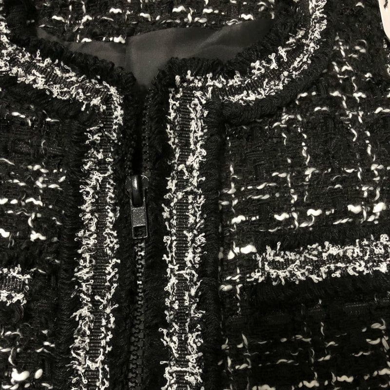 Dámský černobílý kabátek