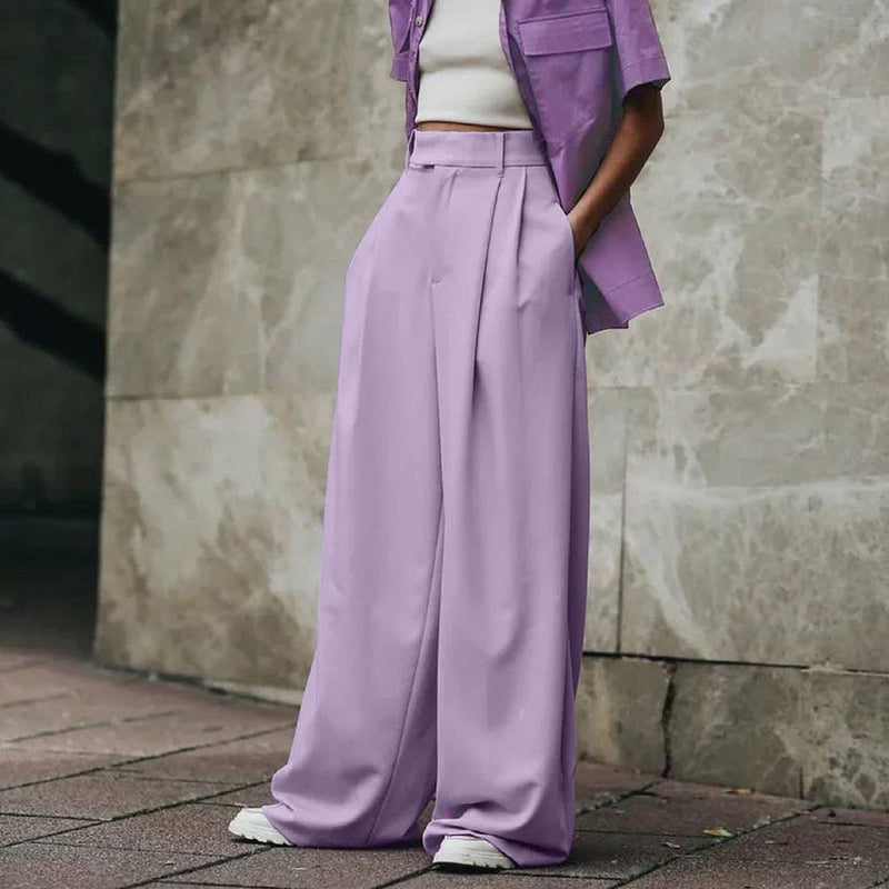 Módní široké dámské kalhoty v lila barvě